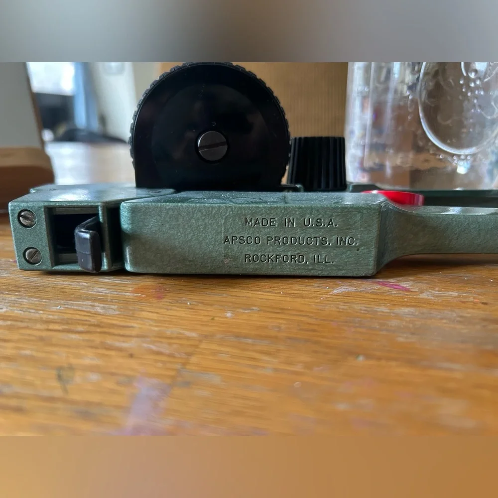 Apsco label maker with two rolls of red tape
